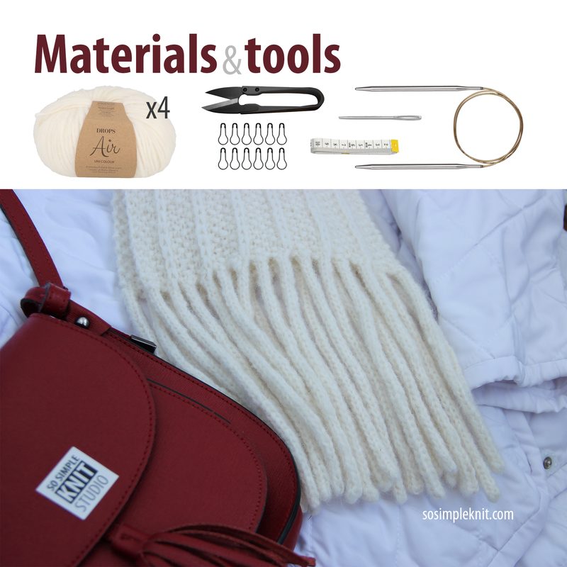 The image shows a collection of materials and tools for a knitting project, prominently featuring a skein of white yarn labeled "Air," a pair of scissors, knitting needles, a measuring tape, and some stitch markers. These items are arranged on a light background alongside a red handbag, with the bottom portion of a white scarf visible, showcasing its fringed ends. The text "Materials & tools" is displayed at the top in bold.