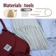 The image shows a collection of materials and tools for a knitting project, prominently featuring a skein of white yarn labeled "Air," a pair of scissors, knitting needles, a measuring tape, and some stitch markers. These items are arranged on a light background alongside a red handbag, with the bottom portion of a white scarf visible, showcasing its fringed ends. The text "Materials & tools" is displayed at the top in bold.