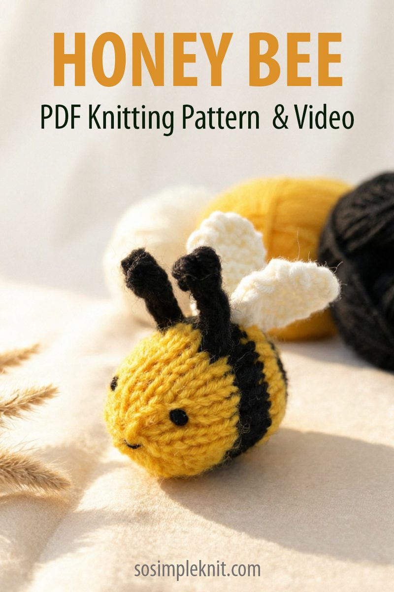 Knitted amigurumi honey bee made of yellow and black yarn on a light background with yarn balls, image for a PDF knitting pattern