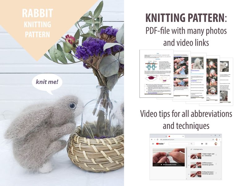 A light-colored, soft-textured bunny toy sits next to a small glass vase filled with dried flowers. The bunny is positioned beside a round wicker basket. On the right side, there is a text block showcasing the knitting pattern details, accompanied by preview images of the PDF file and links to video tutorials. The background is a simple white wood panel, creating a clean and minimalist aesthetic.