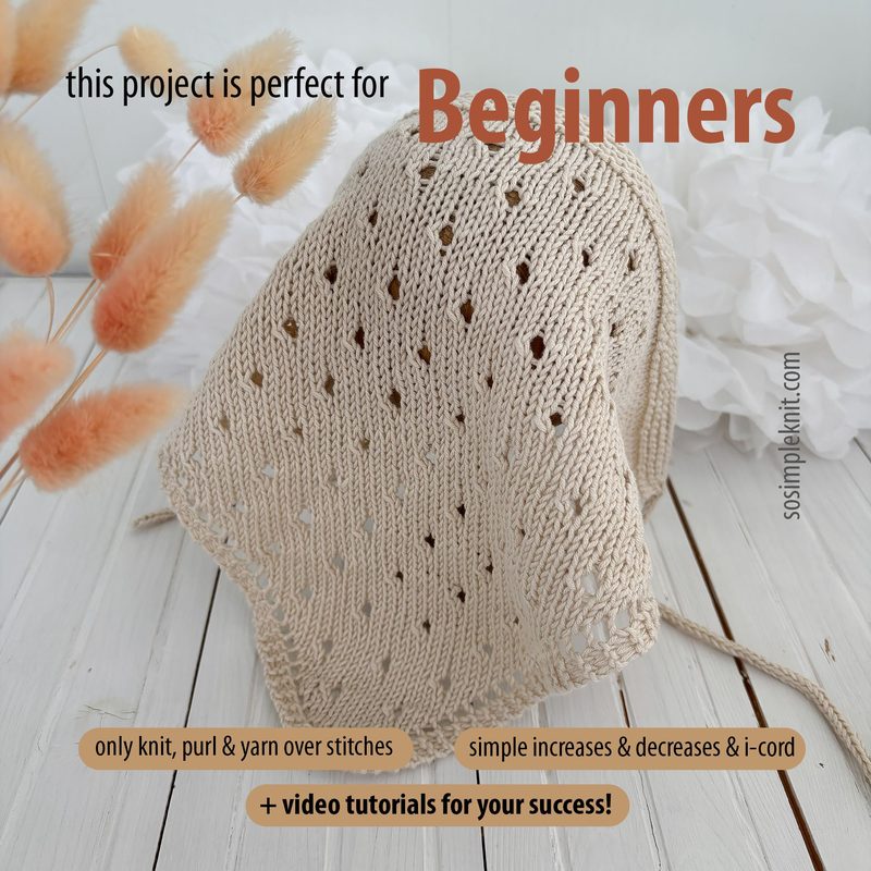The image features a knitted triangle scarf displayed on a light wooden surface, draped casually with its tip pointing towards the viewer. The scarf showcases a delicate, open hole pattern in a soft beige color. In the background, there are light, textured white and pale pink elements resembling flowers or fabric. Text overlays include the words "Beginners" in bold red, accompanied by descriptions of the project's simplicity and resources for learning. The overall composition has a warm and invi