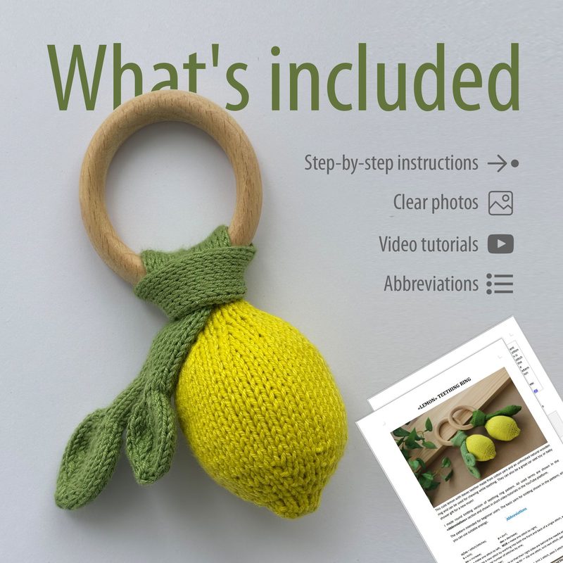 A knitted lemon toy sits beside a wooden ring, with a green leaf extending from the top. The lemon is bright yellow, and the leaf is a rich green. In the background, there is a partially visible instructional document featuring photos and text about the knitting pattern. The overall layout includes headings like "What's included" in a modern sans-serif font, accompanied by icons indicating tutorial features. The color scheme is light and neutral, focusing on the vibrant colors of the toy.