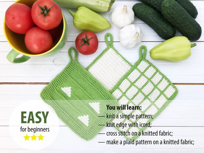 The image features three knitted dishcloths arranged on a light wooden surface. The dishcloths are primarily green with white designs, including a simple triangle pattern and a grid pattern. Surrounding the dishcloths are fresh vegetables, including red tomatoes, cucumbers, green bell peppers, and garlic. The background has a light and bright aesthetic, with a bowl or basket visible. In the bottom left corner, there is a label indicating "EASY for beginners" with a star rating.